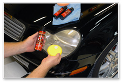 Apply Wolfgang Plastik Surface Sealant with the yellow foam applicator.