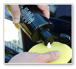 Pour a nickel-size amount of polish onto a clean terry or microfiber applicator pad. This should be enough to cover half of the hood or an entire fender. Spread the polish across the section in an overlapping motion. 